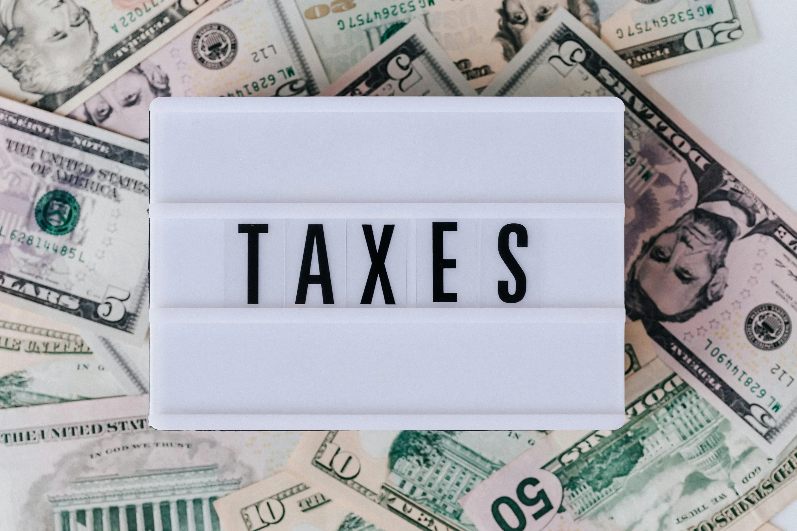 the words tax on a sign 