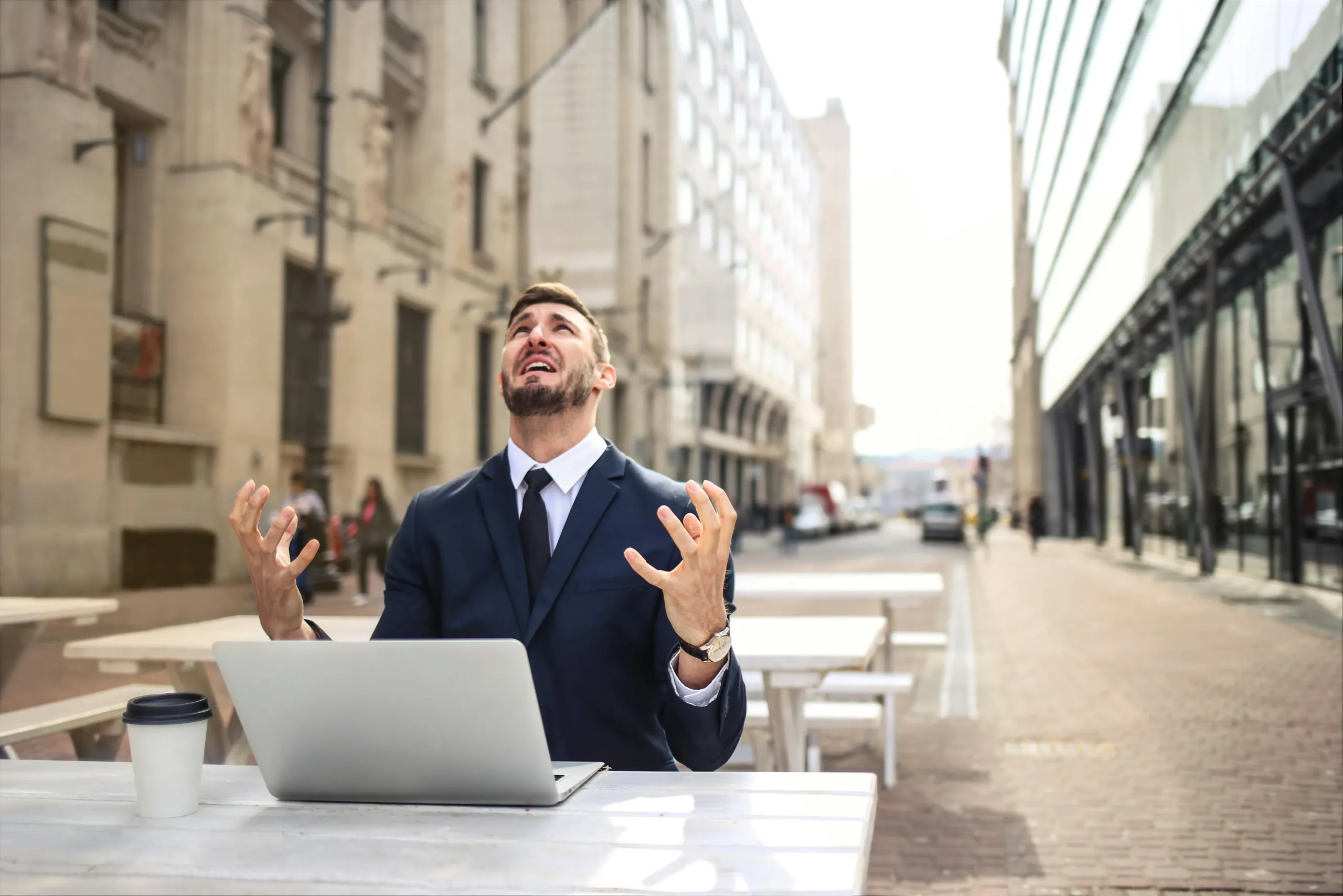 man sitting in front of a computer 