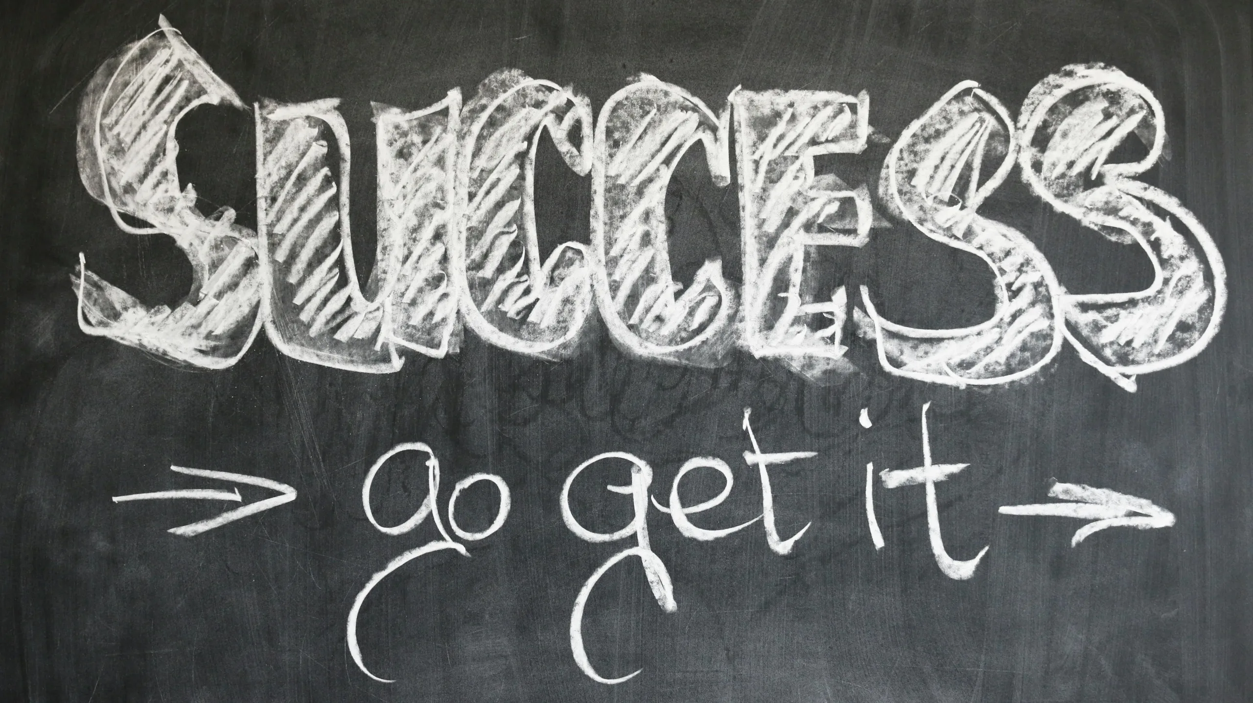words Success on a wall 