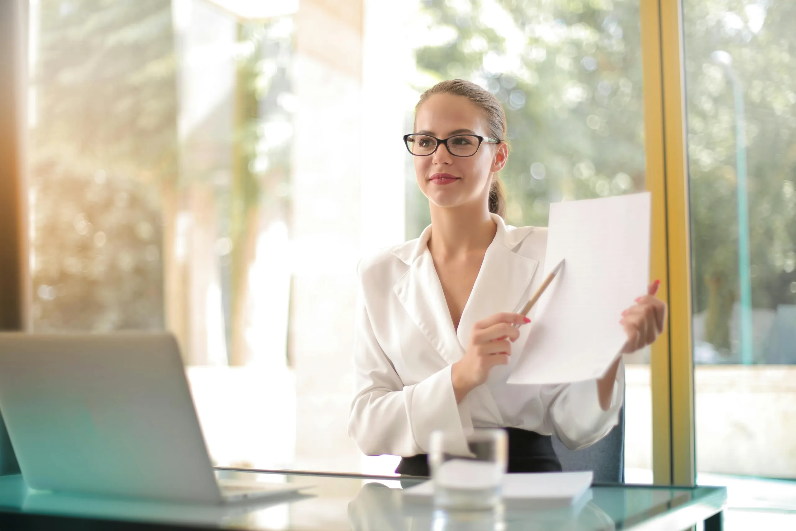 woman teaching tax form paperwork