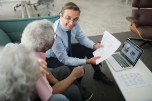 man showing people financial information