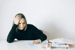 lady looking at tax paperwork