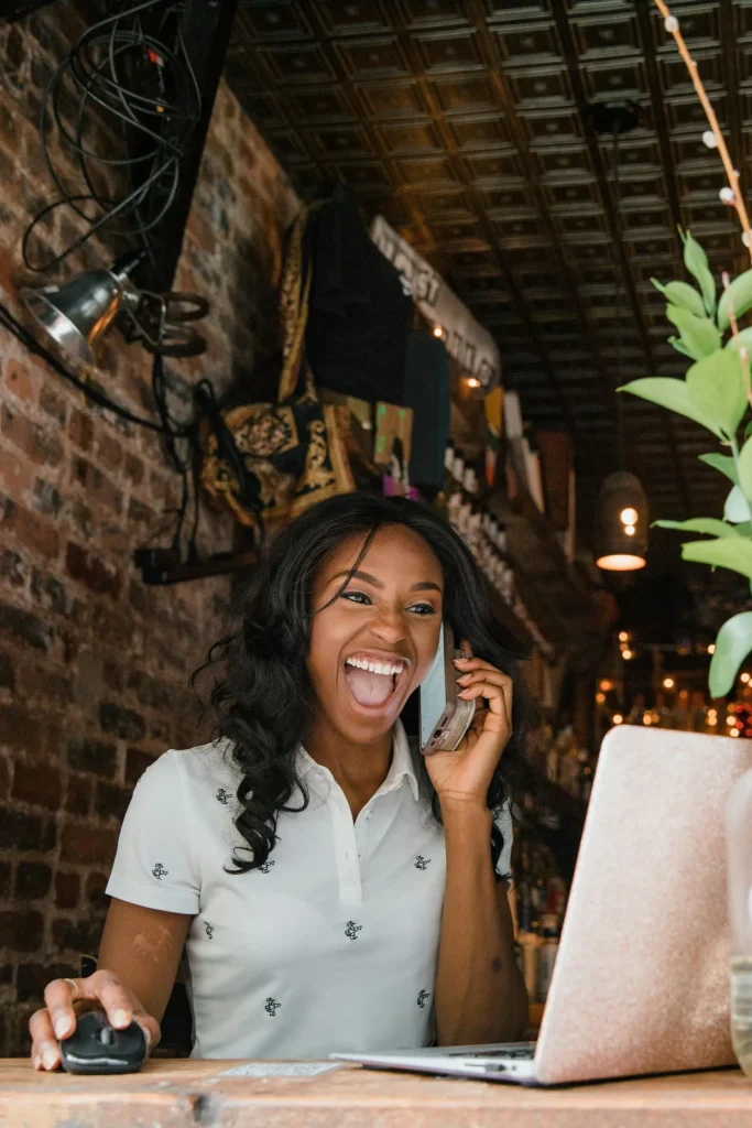 A business owner is calling Simplicity Financial with a cell phone while browsing our blog on her laptop. She wants her SALT tax deduction.