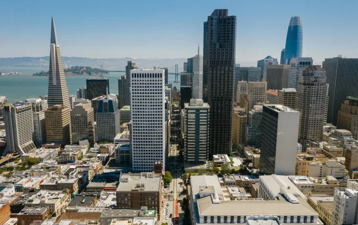 A skyline view of a city in Silicon Valley with business buildings and high rise condos.
